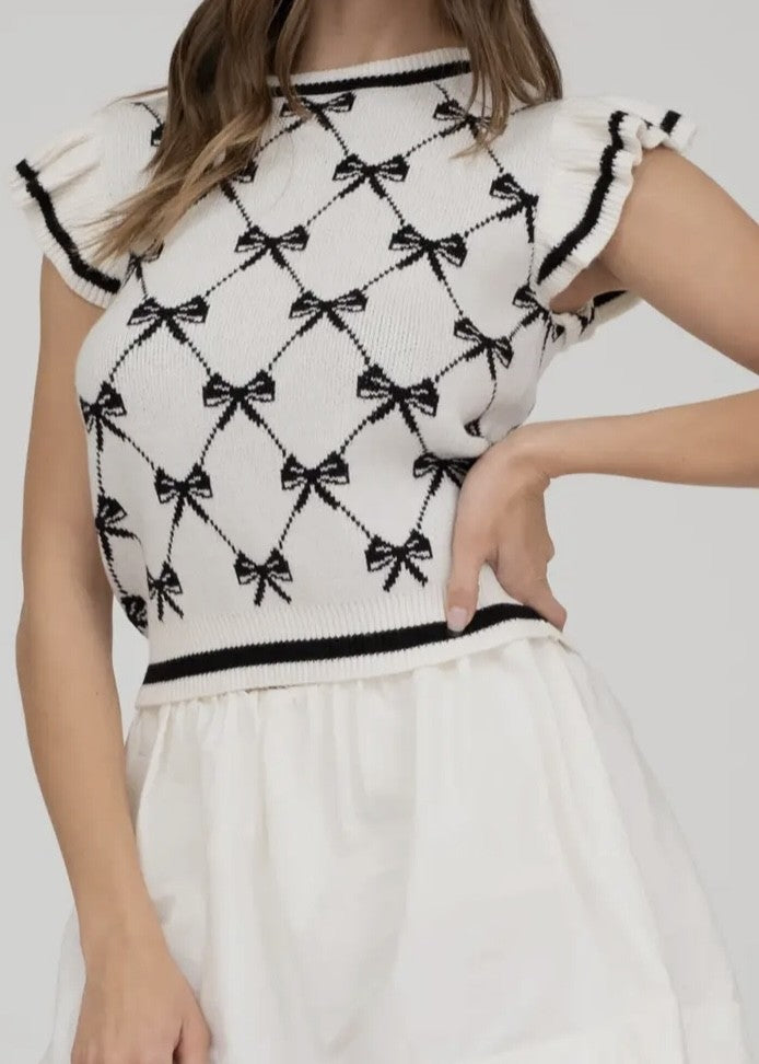 Lennox Bow Pattern Ruffle Cap Sleeve Sweater