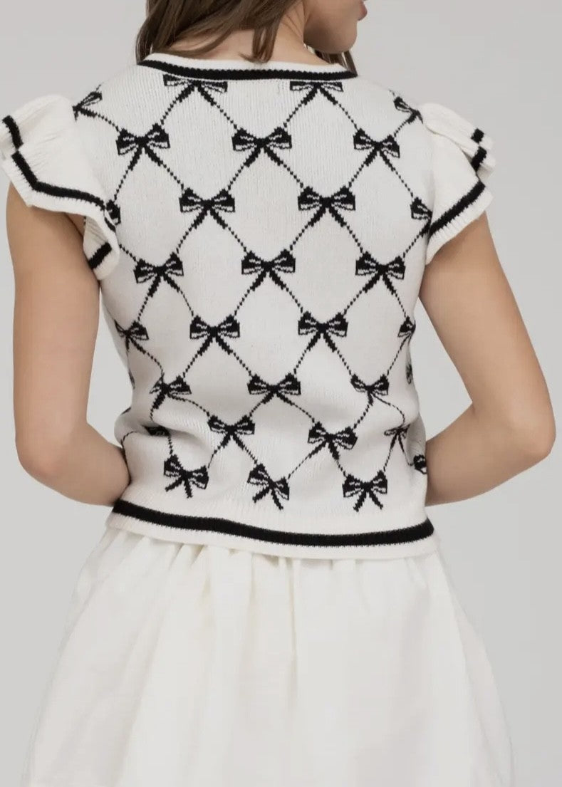 Lennox Bow Pattern Ruffle Cap Sleeve Sweater